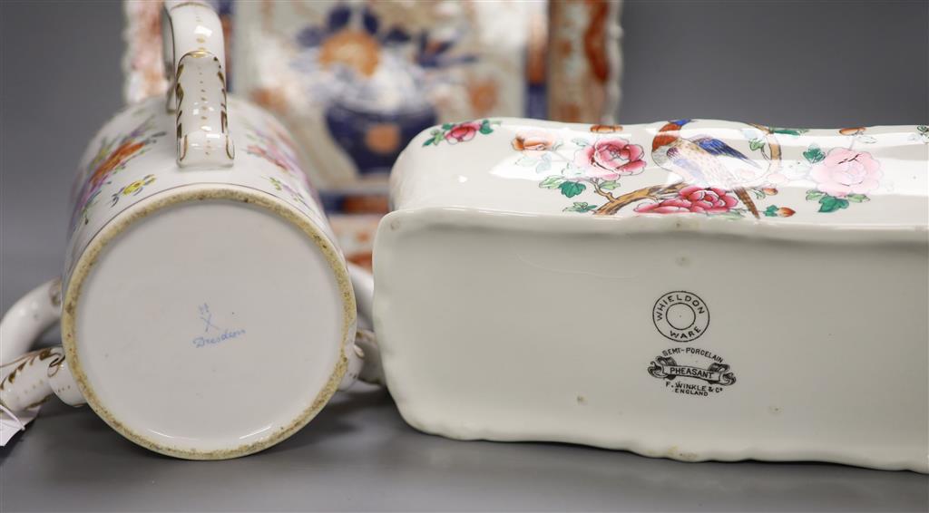 A Dresden porcelain three handled cup, an Imari dish and one other dish